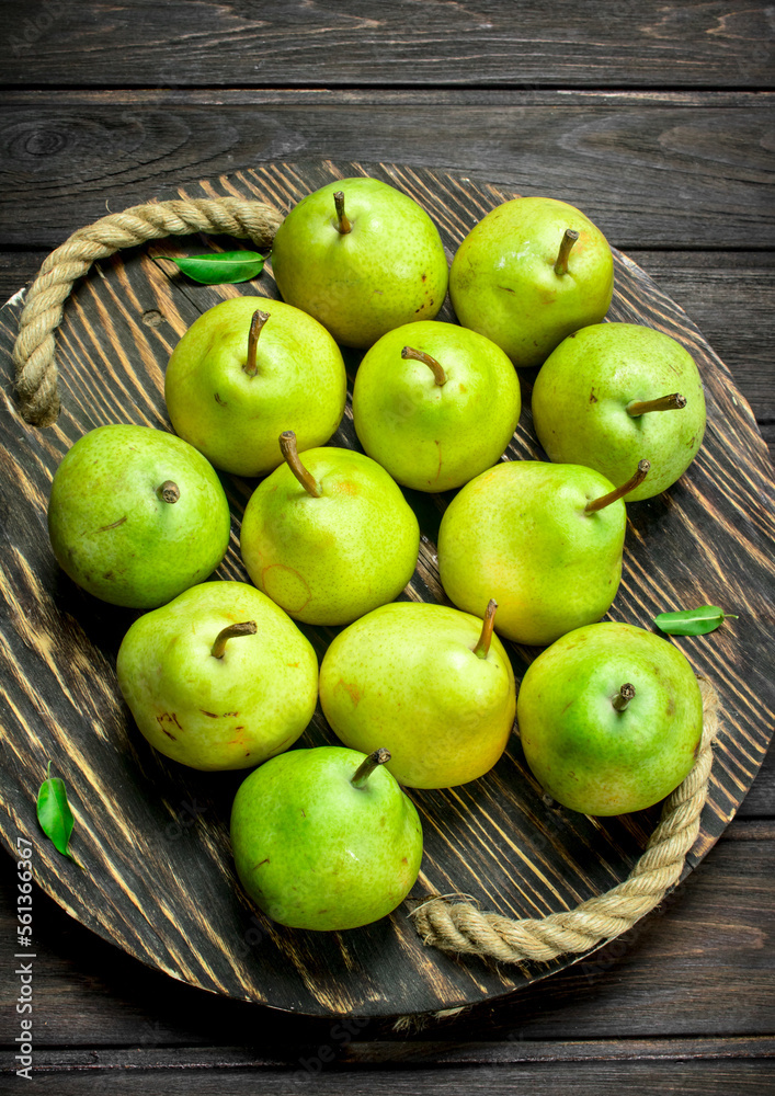 Fresh pears on tray.