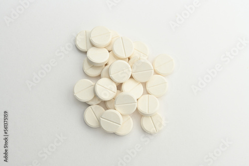 Pills. Drugs for health. Medication tablets are capsized on the tablets. Various pharmaceutical medicine pills, tablets and capsules on white background