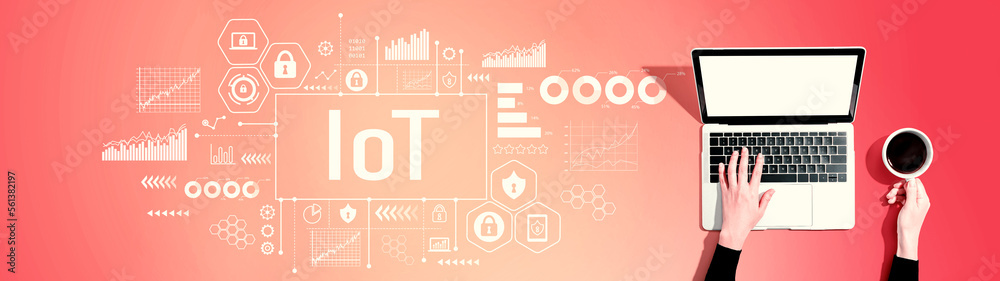 IoT theme with person using a laptop computer IoT theme with person using a laptop computer