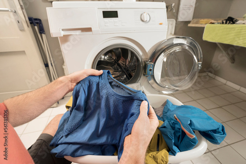 Man washing clothes photo