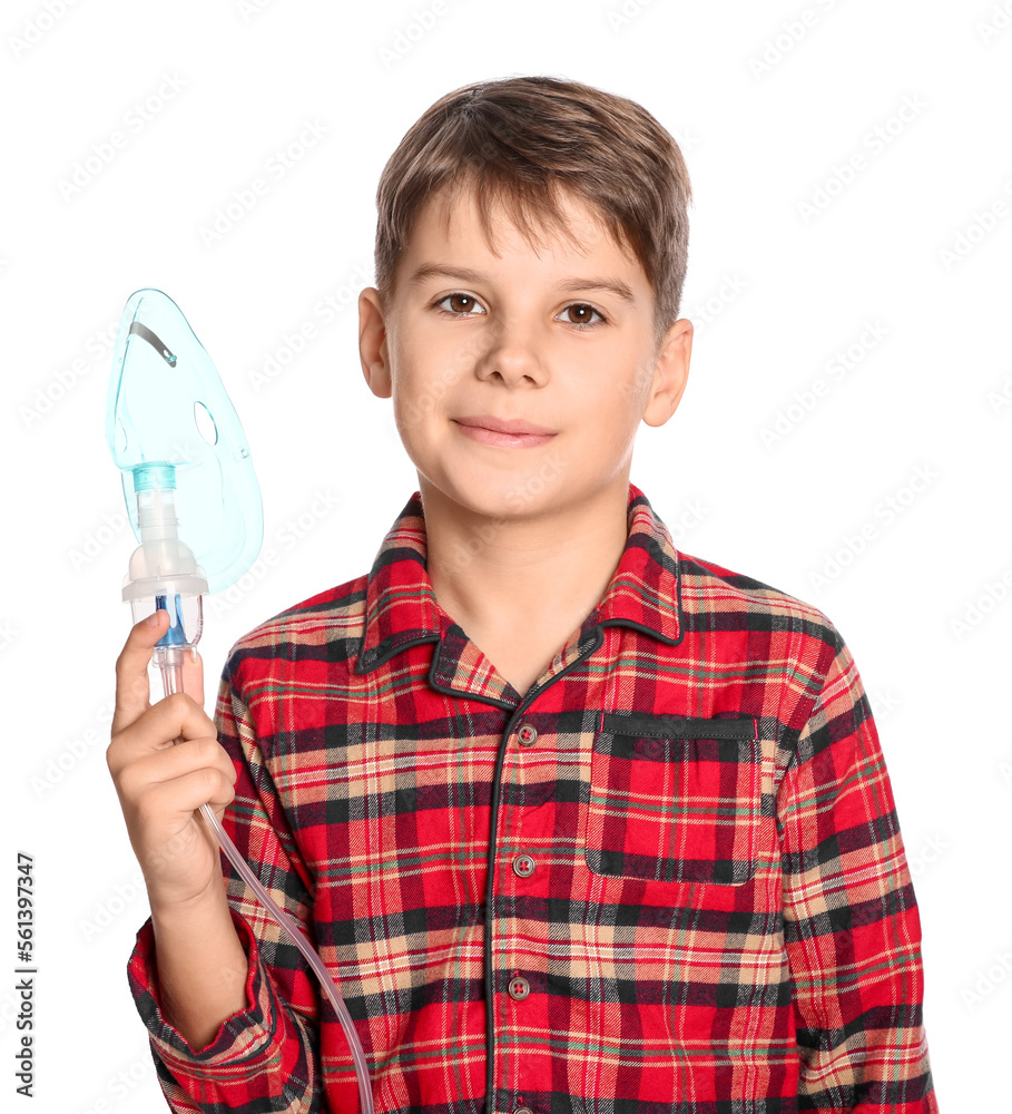 Boy holding nebulizer for inhalation on white background Boy holding nebulizer for inhalation on white background