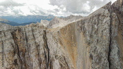 Dolomite rock wall at mountain range. Dolomites UNESCO Italian Alps landscape