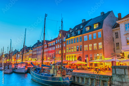 Canvas Print Copenhagen Denmark, night city skyline at Nyhavn harbour with colourful house