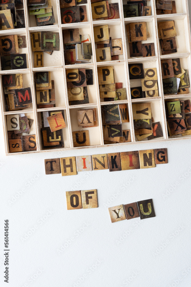 thinking of you and wooden box with chipboard tiles displaying vintage style letters