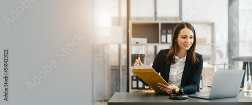 Schilderij op canvas Highly skilled female recruiter consulting online on laptop in office meeting white lawyer or financial advisor convene law in video conferencing and audio calls on social media applications