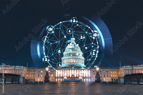 Front view, Capitol dome building at night, Washington DC, USA. Illuminated Home of Congress and Capitol Hill. Social media hologram. Concept of networking and establishing new people connections photo