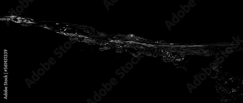 Liquid suface line between underwater and above water with black background. Show water bubble splashing and floating drop. Close up water bubbles texture and curve line of surface. Film grain style.