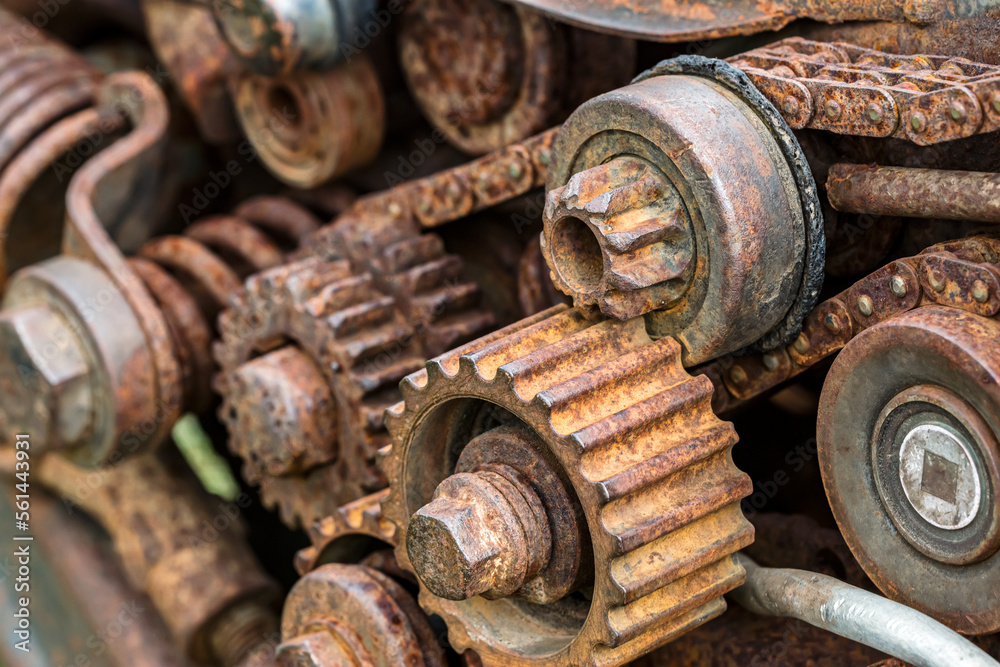old rusty metallic industrial cogwheels and sprockets. mechanical details, closeup. old rusty metallic industrial cogwheels and sprockets. mechanical details, closeup.