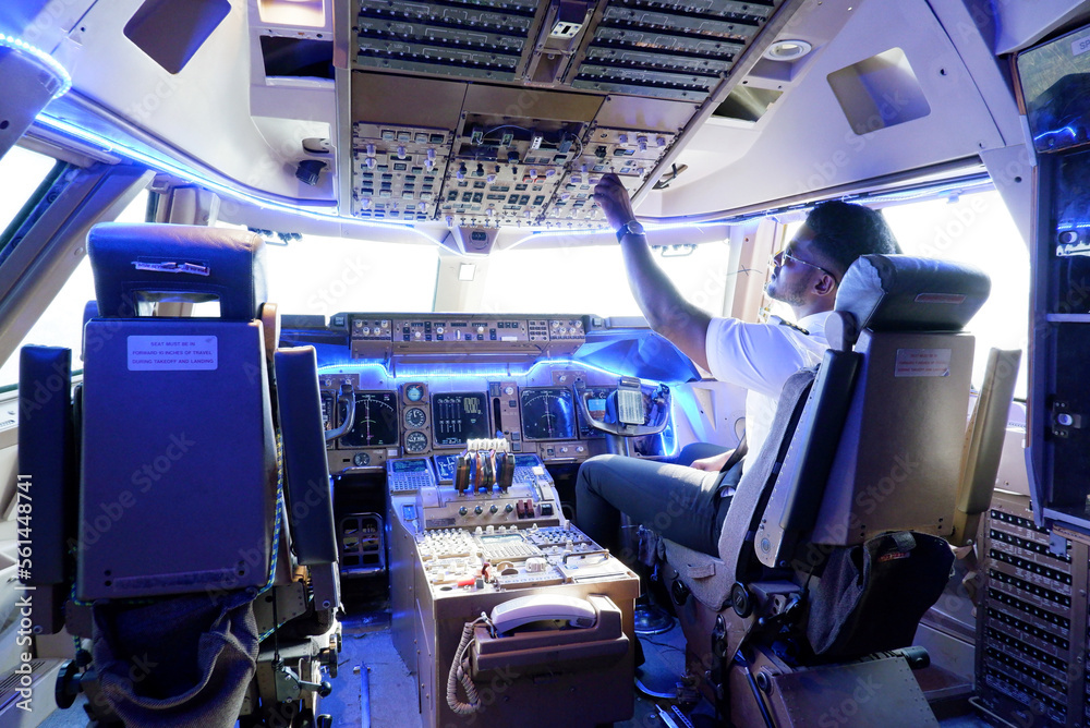 The captain of the plane sits in the cabin of the plane. The captain of the plane sits in the cabin of the plane.