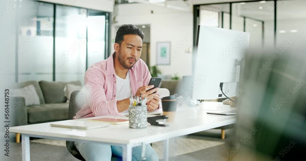 Asian man, eating apple and desk in office for lunch time snack, relax planning strategy on pc and checking phone. Businessman, reading smartphone communication and eat healthy food for nutrition