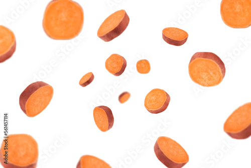 Falling sweet potato, slice, isolated on white background, selective focus