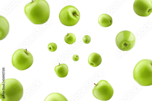 Falling green juicy apple isolated on white background, selective focus
