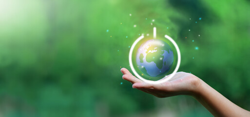 Glowing planet Earth in power button. Earth hour concept.