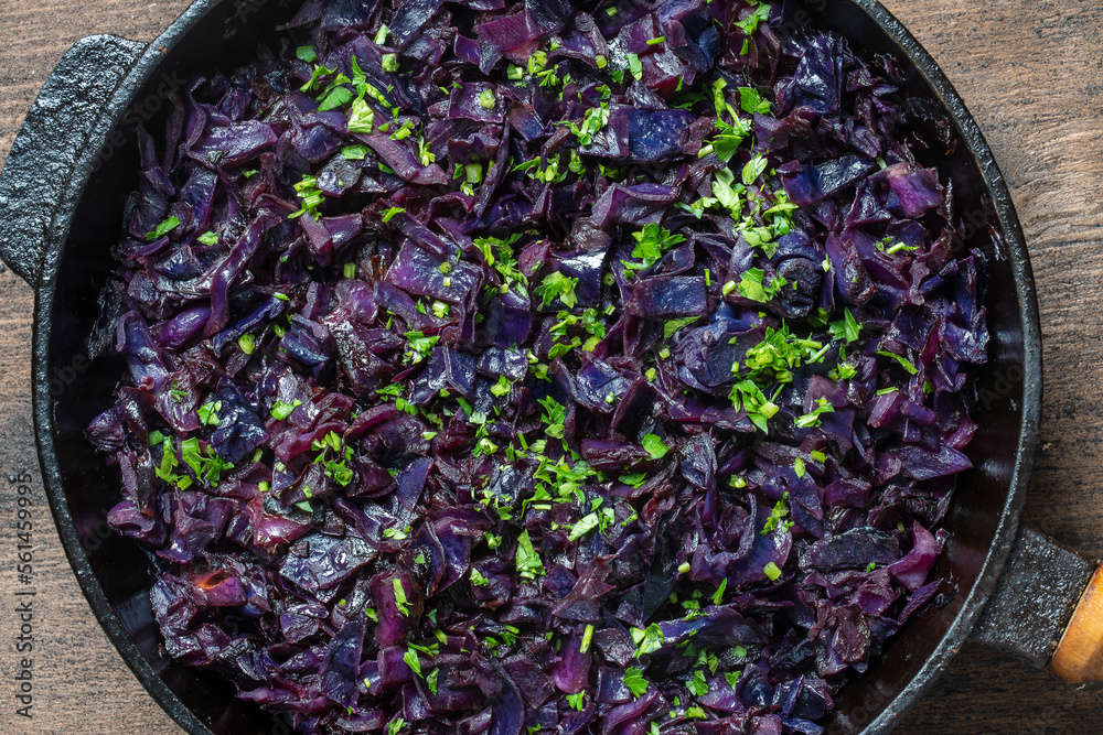 Red cabbage are panfried until lightly charred, then braised in mulled