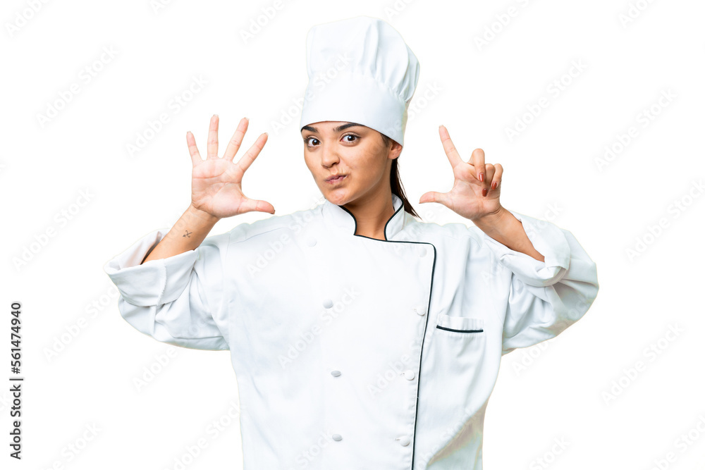 Young woman Chef over isolated chroma key background counting seven with fingers Young woman Chef over isolated chroma key background counting seven with fingers