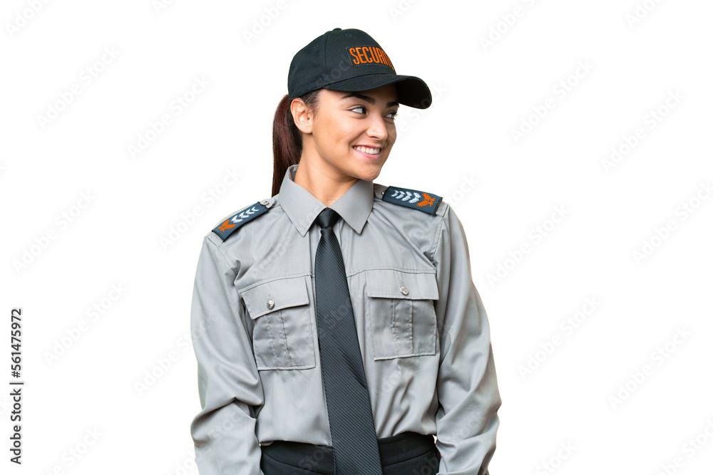 Young safeguard woman over isolated chroma key background looking side Young safeguard woman over isolated chroma key background looking side