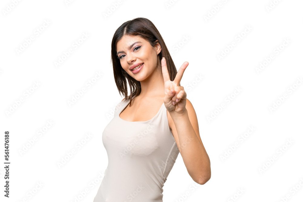 Young Russian woman over isolated chroma key background smiling and showing victory sign Young Russian woman over isolated chroma key background smiling and showing victory sign