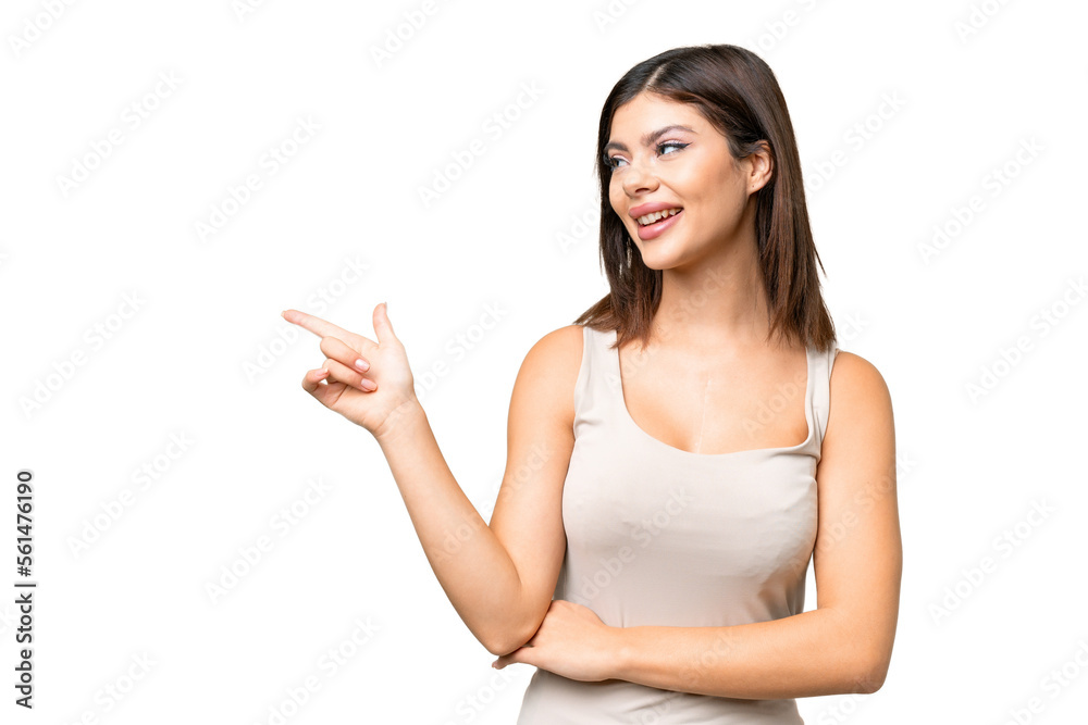 Young Russian woman over isolated chroma key background pointing finger to the side and presenting a product Young Russian woman over isolated chroma key background pointing finger to the side and presenting a product