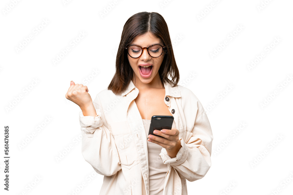 Young Russian woman over isolated chroma key background surprised and sending a message Young Russian woman over isolated chroma key background surprised and sending a message