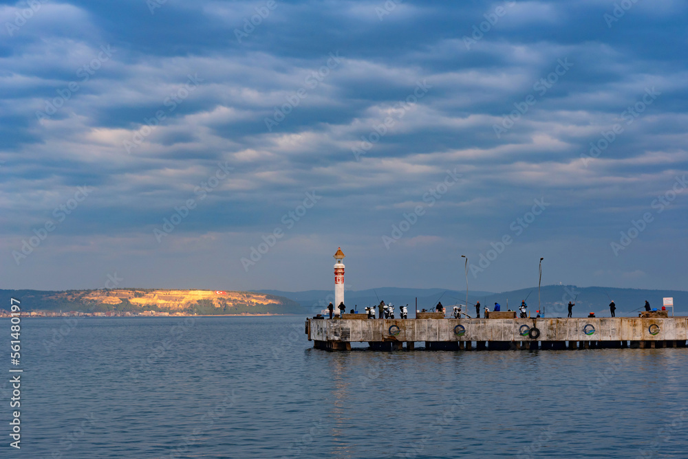 Stunning scenic panorama of the pier in the port city of Canakkale looking towards the Dardanelles and Gallipoli Peninsular, western Turkish coastline. .