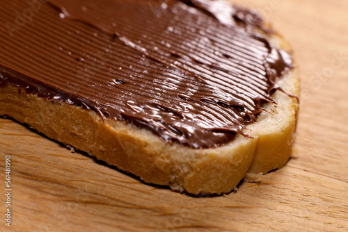 chocolate cream, pasta on toast on wooden table, selective focus