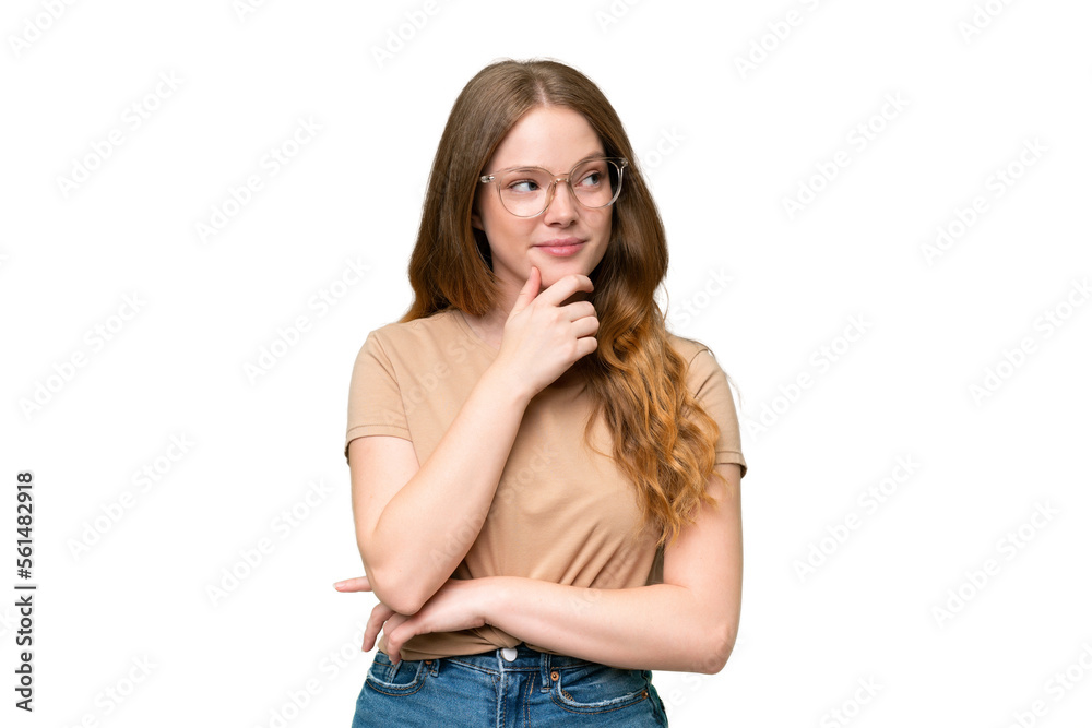 Young pretty woman over isolated background thinking an idea while looking up Young pretty woman over isolated background thinking an idea while looking up
