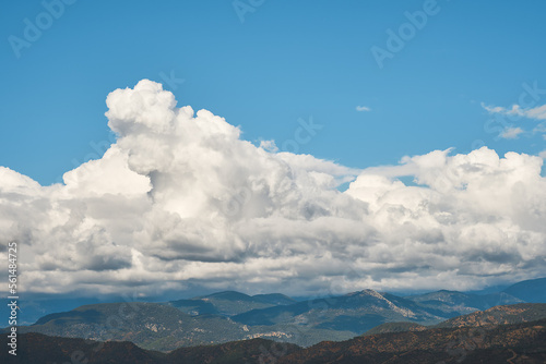 Beautiful view of the mountain landscape in Antalya on the Aegean coast. Clouds over mountains after rain, background idea, travel and vacation story