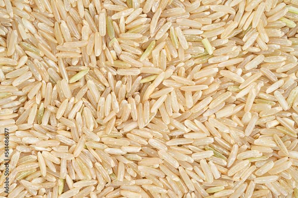 Whole grain brown rice texture. Top view, close up Whole grain brown rice texture. Top view, close up