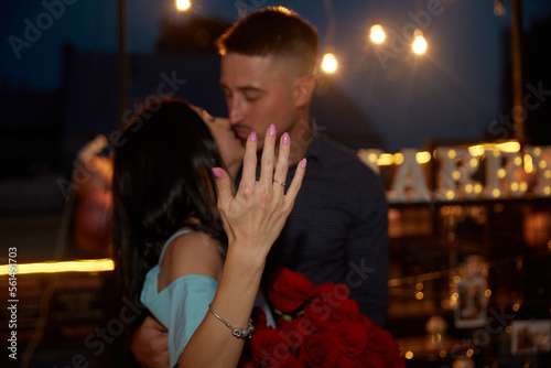 Happy Woman Shows  Engagement Ring After Proposal