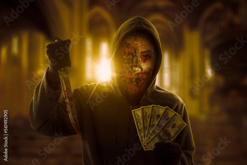 Zombie wearing hoodie holding money and knife