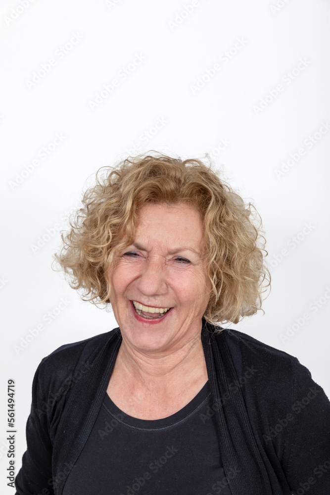attractive laughing mature woman with curly hair attractive laughing mature woman with curly hair