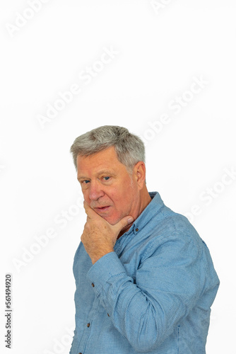 caucasian mature man with gray hair in sorrow