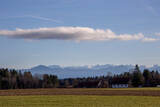 Mountain panorama of the Alps near Weilheim on a sunny winter evening