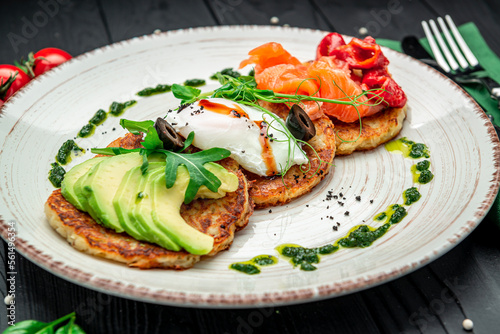 Potatoes pancakes, Hash brown. Hashbrown with feta cheese, salted salmon and chopped avocado.