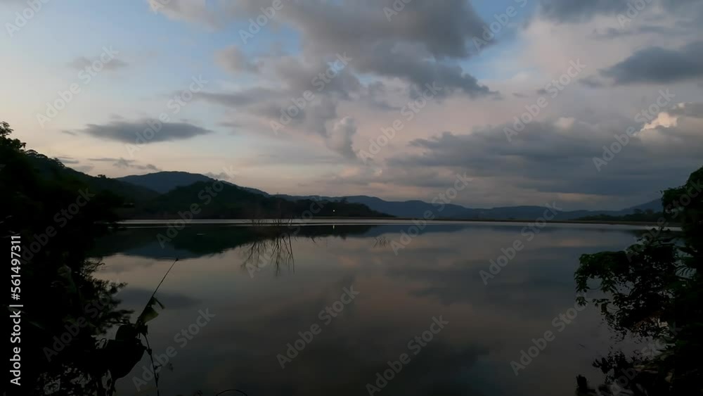 Lake at sunset with the reflection of trees. Lake at sunset with the reflection of trees.
