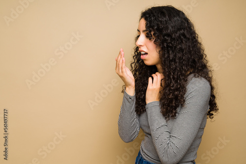 Hispanic woman with bad breath photo