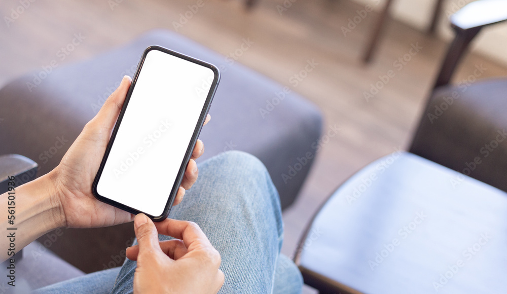 cell phone blank white screen mockup.hand holding texting using mobile on desk at office.background empty space for advertise.work people contact marketing business,technology cell phone blank white screen mockup.hand holding texting using mobile on desk at office.background empty space for advertise.work people contact marketing business,technology
