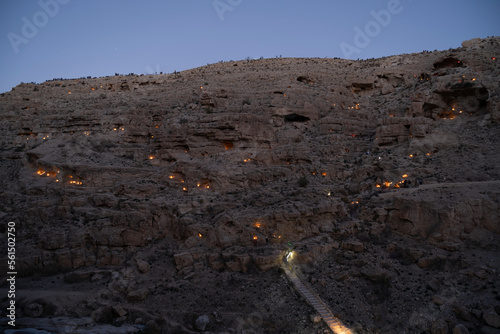 The tradition of lighting candles in front of the Mer Saba Monastery in the Yehuda Desert photo