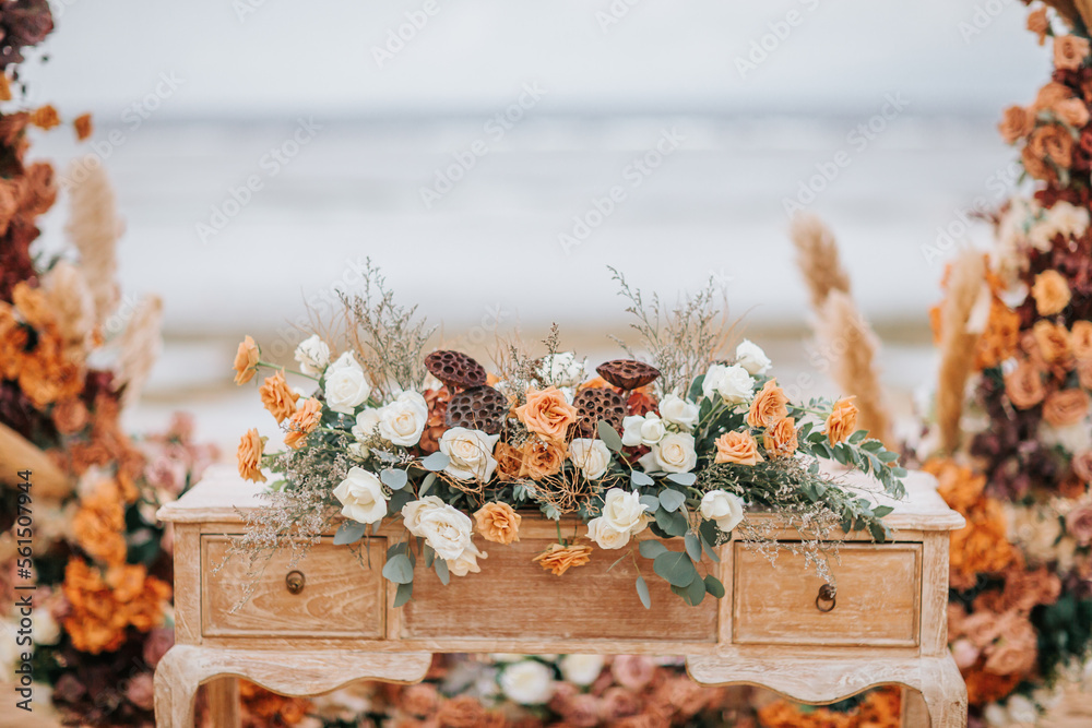 Rustic wedding set up on beach. Beautiful tropical outdoor ceremony or party with ocean view. Destination weddings concept