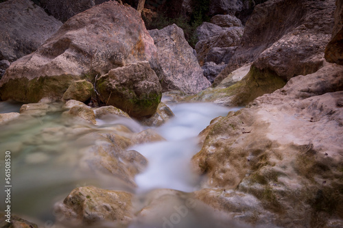 zoom stones silky water and view of the walkways of alquezar huesca spain © josemaria