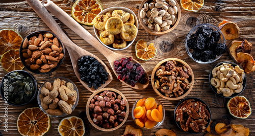 Composition with a variety of dried fruits and assorted nuts. © monticellllo