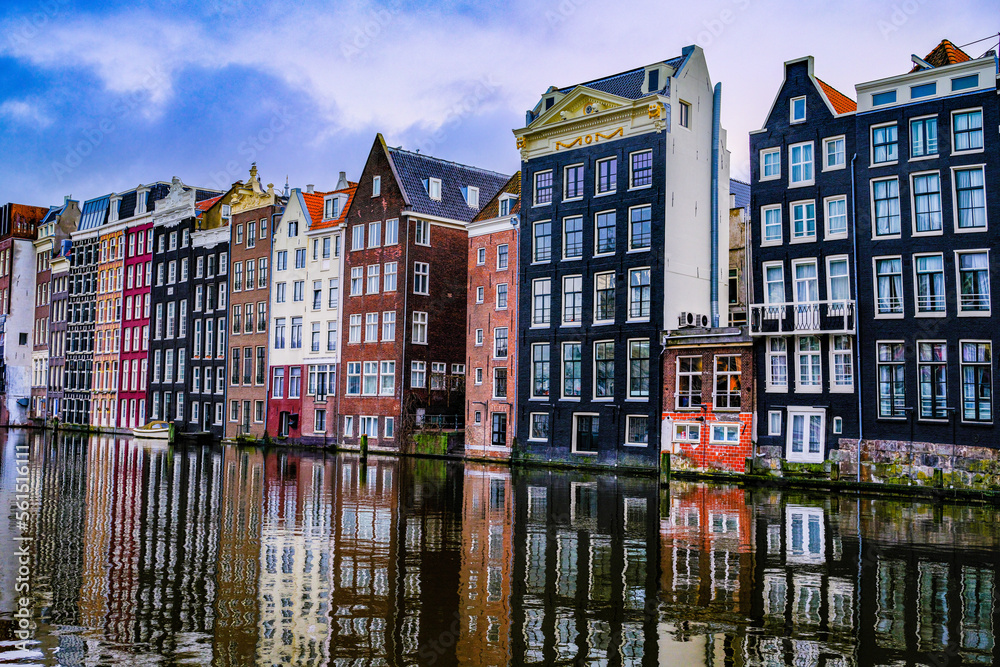 city ​​houses on a canal in amsterdam