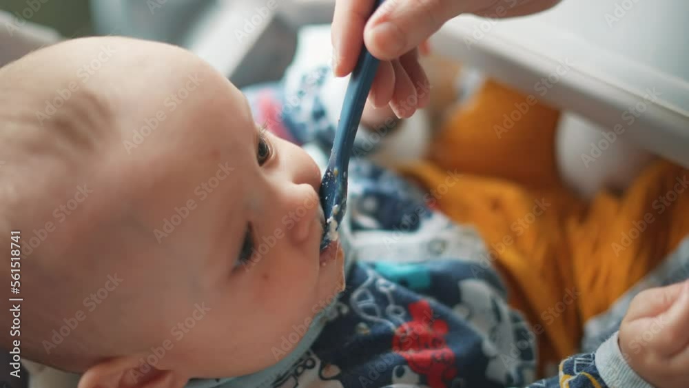 Healthy food. Cute baby boy face. beautiful a baby eats dirty. Healthy