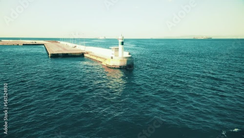 Lighthouse in the port of Piraeus  on the Mediterranean coast in Athens. Pireaus Cruise Ship Terminal 
