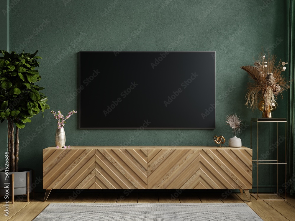 Living room with wall mounted tv and wood on dark green color