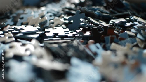 close-up puzzle pieces in motion. puzzle pieces jigsaw.