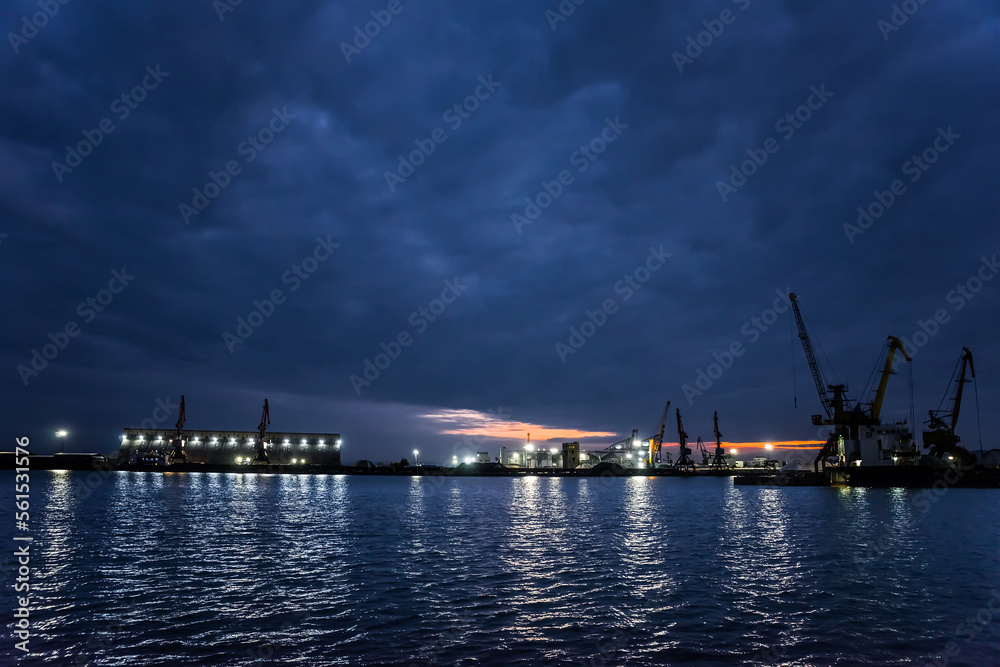 Burgas port in cloudy evening at sunset. Seascape in Bulgaria.