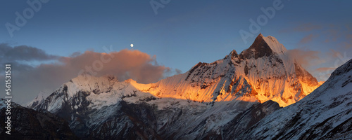 Snow capped Mt. Machapuchare at sunset, view from Annapurna base camp. © Anna