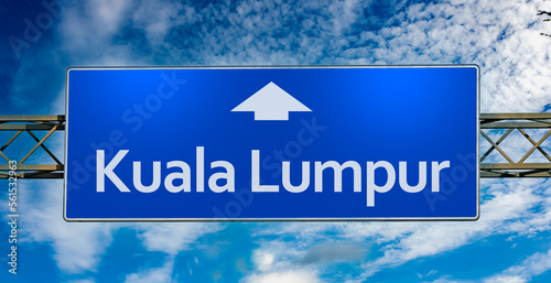 Canvas Print Road sign indicating direction to the city of Kuala Lumpur