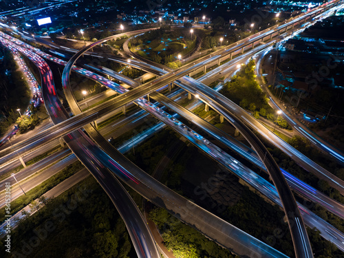 Traffic transportation above circle road of Drone aerial view fly , high angle. Public transport or commuter city life concept of economic and energy